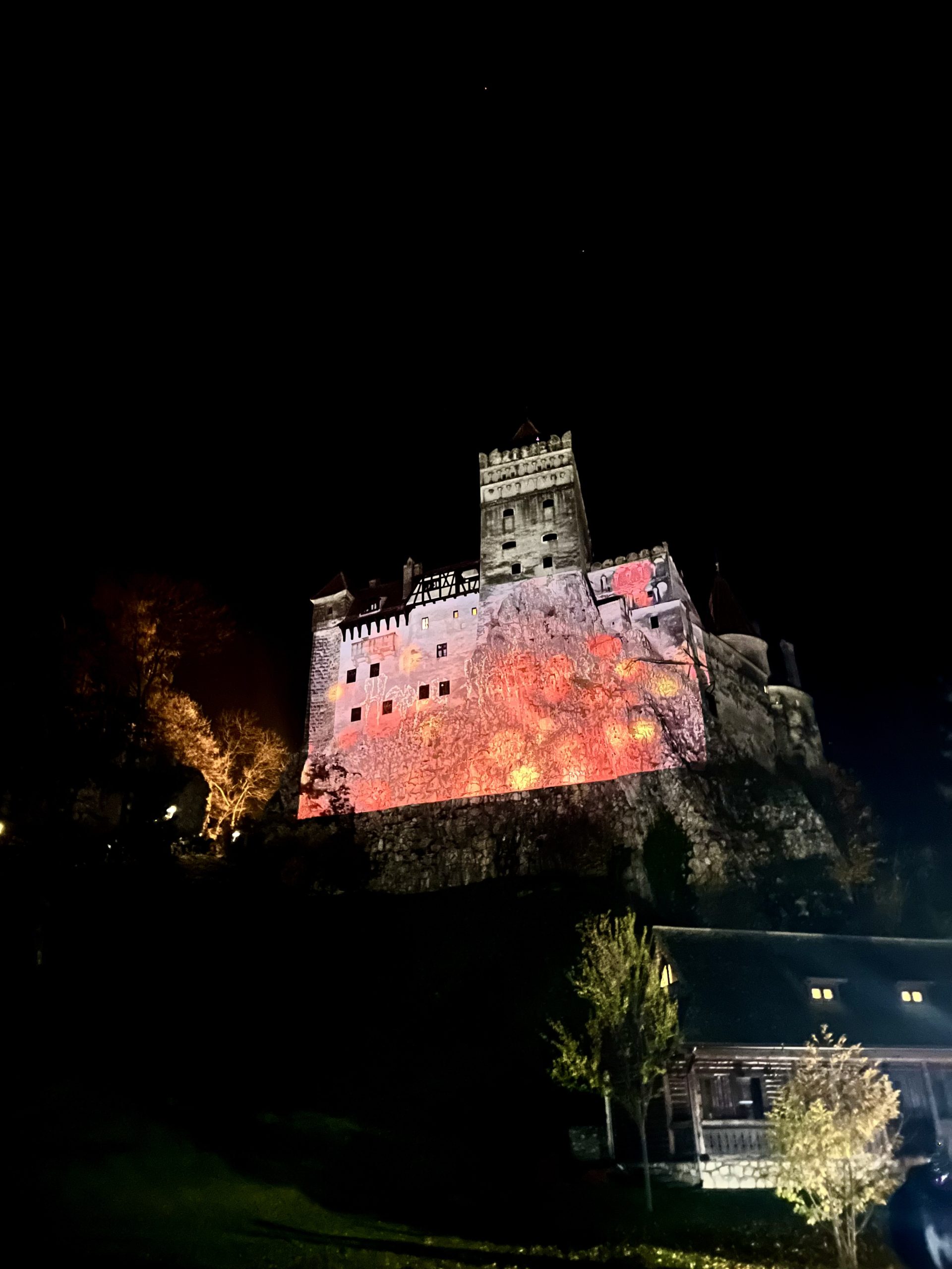 Bran Castle - Iconic medieval fortress near Brașov, Romania, featuring dramatic architecture and storied history linked to Count Dracula and Vlad the Impaler; travel guide to Brasov