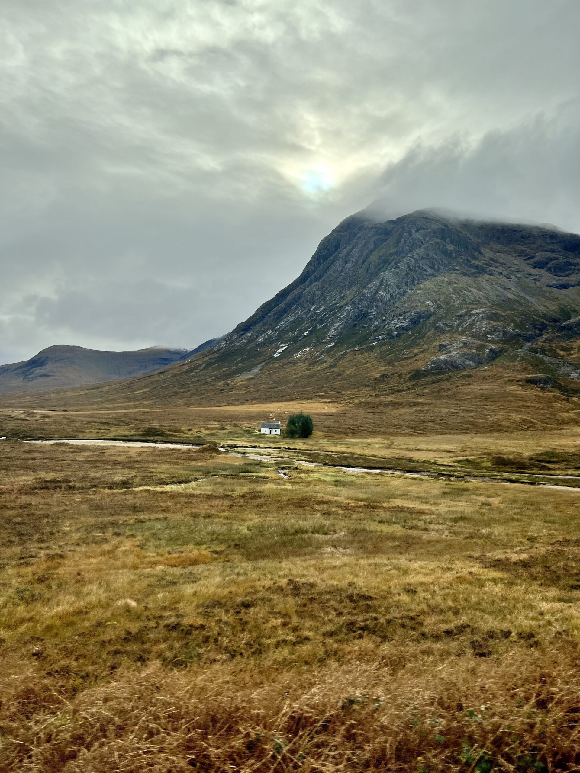 Captivating Scotland: Lush Green Hills under Overcast Skies - Travel Inspirations