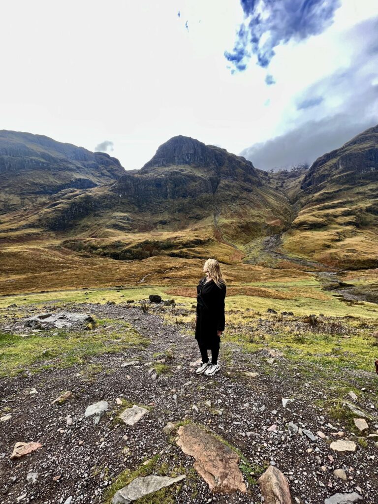 Captivating Scotland: Lush Green Hills under Overcast Skies - Travel Inspirations; travel guide to Scotland