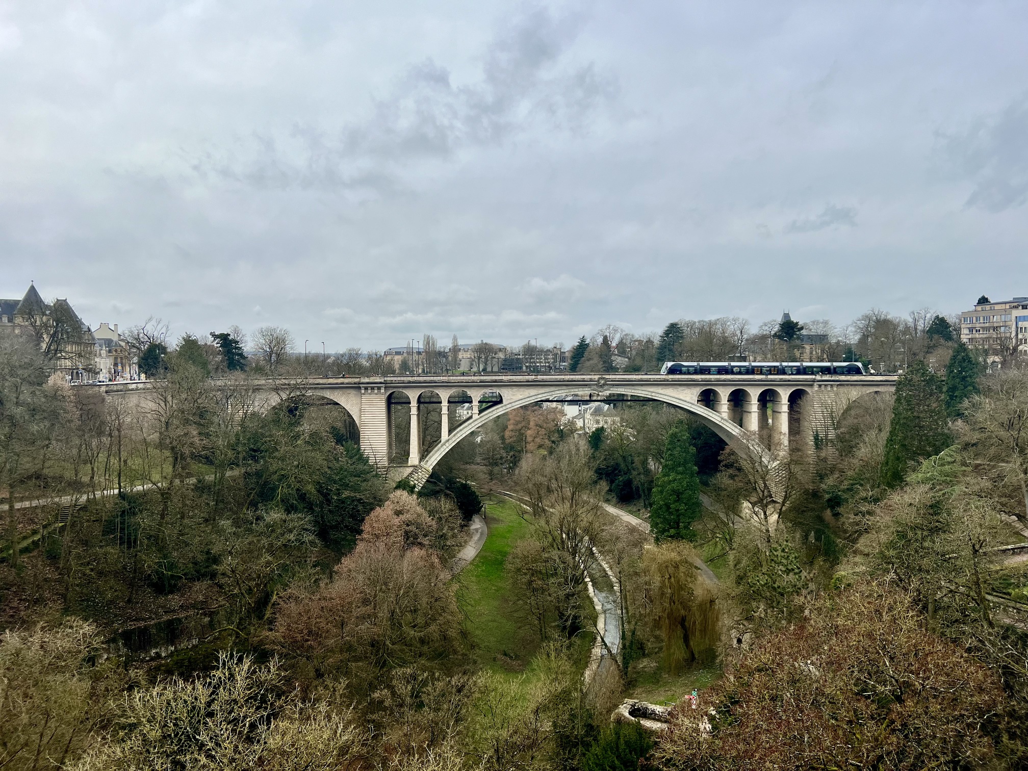 Spectacular view of Luxembourg City skyline with its historic bridges, medieval architecture, and the iconic Casemates du Bock, showcasing the charm and beauty of Luxembourg; travel guide to Luxembourg