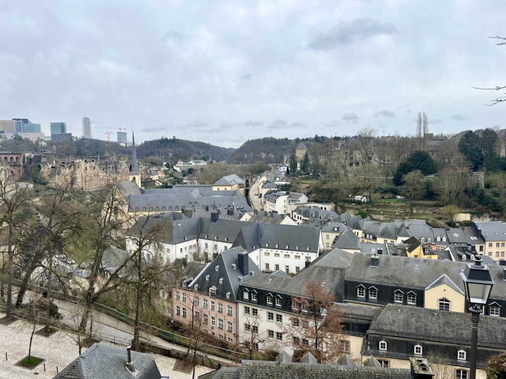 Spectacular view of Luxembourg City skyline with its historic bridges, medieval architecture, and the iconic Casemates du Bock, showcasing the charm and beauty of Luxembourg; 10 Must-Have Authentic Luxe Souvenirs from Luxembourg