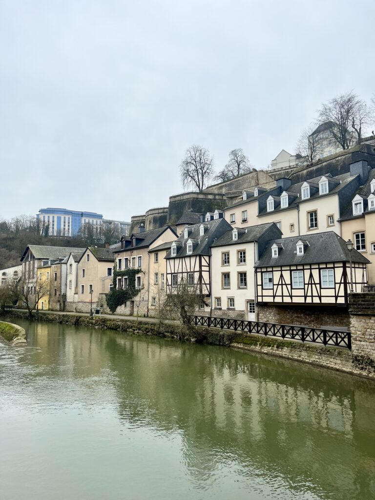 Spectacular view of Luxembourg City skyline with its historic bridges, medieval architecture, and the iconic Casemates du Bock, showcasing the charm and beauty of Luxembourg; Luxe Travel: Top Places to Visit in Luxembourg Revealed