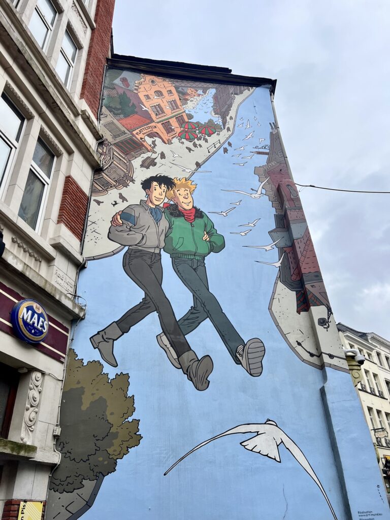 Enchanting view in Brussels, Belgium, with ornate medieval architecture and bustling activity, capturing the essence of Belgian heritage and culture; comic mural trails of Brussels