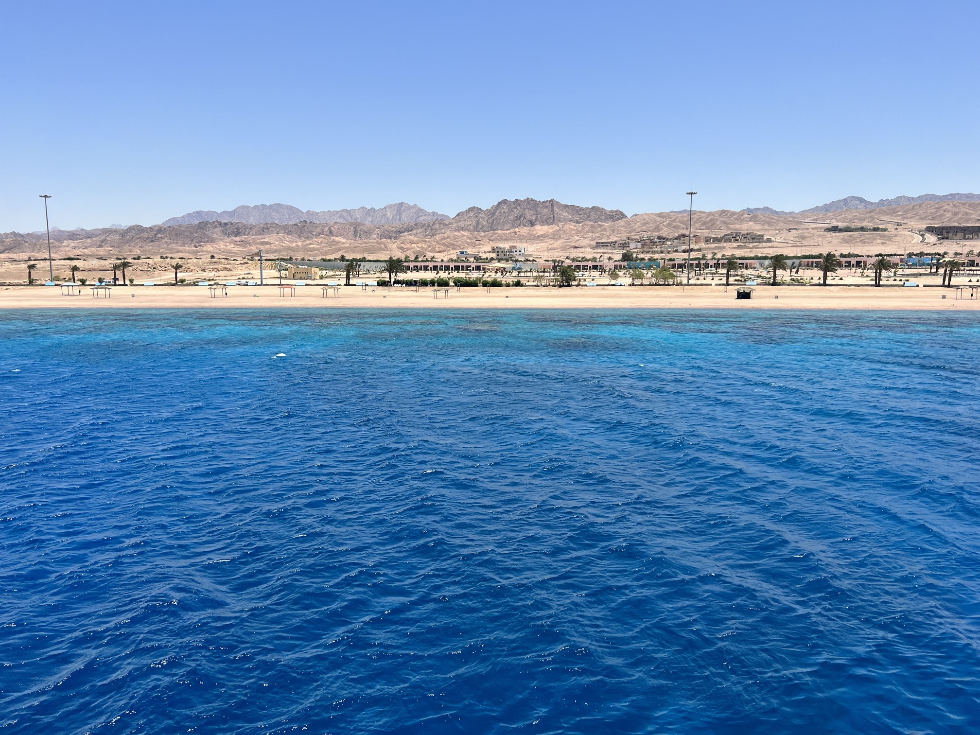 Beautiful landscape of Jordan featuring historic ruins, desert scenery, and unique rock formations. The image highlights Jordan's diverse attractions, including ancient cities, UNESCO World Heritage sites, and stunning natural beauty, making it a popular destination in the Middle East for travelers seeking cultural and outdoor adventures. Travel Guide to Aqaba