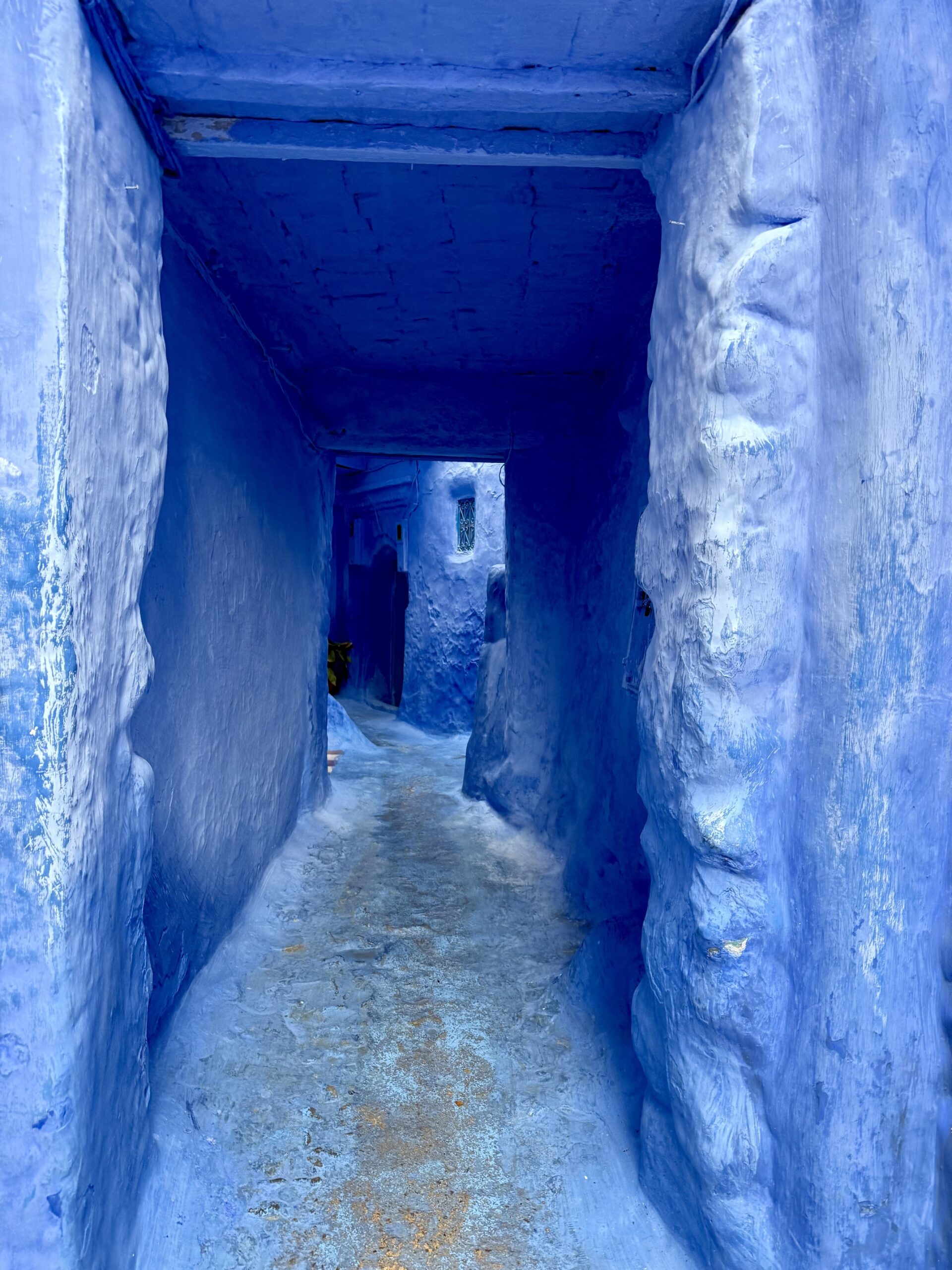 IMG_2639 Colorful streets of Chefchaouen Morocco, known as the Blue City, featuring iconic blue-washed buildings, traditional Moroccan architecture, and scenic Rif Mountain views — top travel destination in Northern Morocco for photography, culture, and authentic experiences; travel guide to Chefchaouen