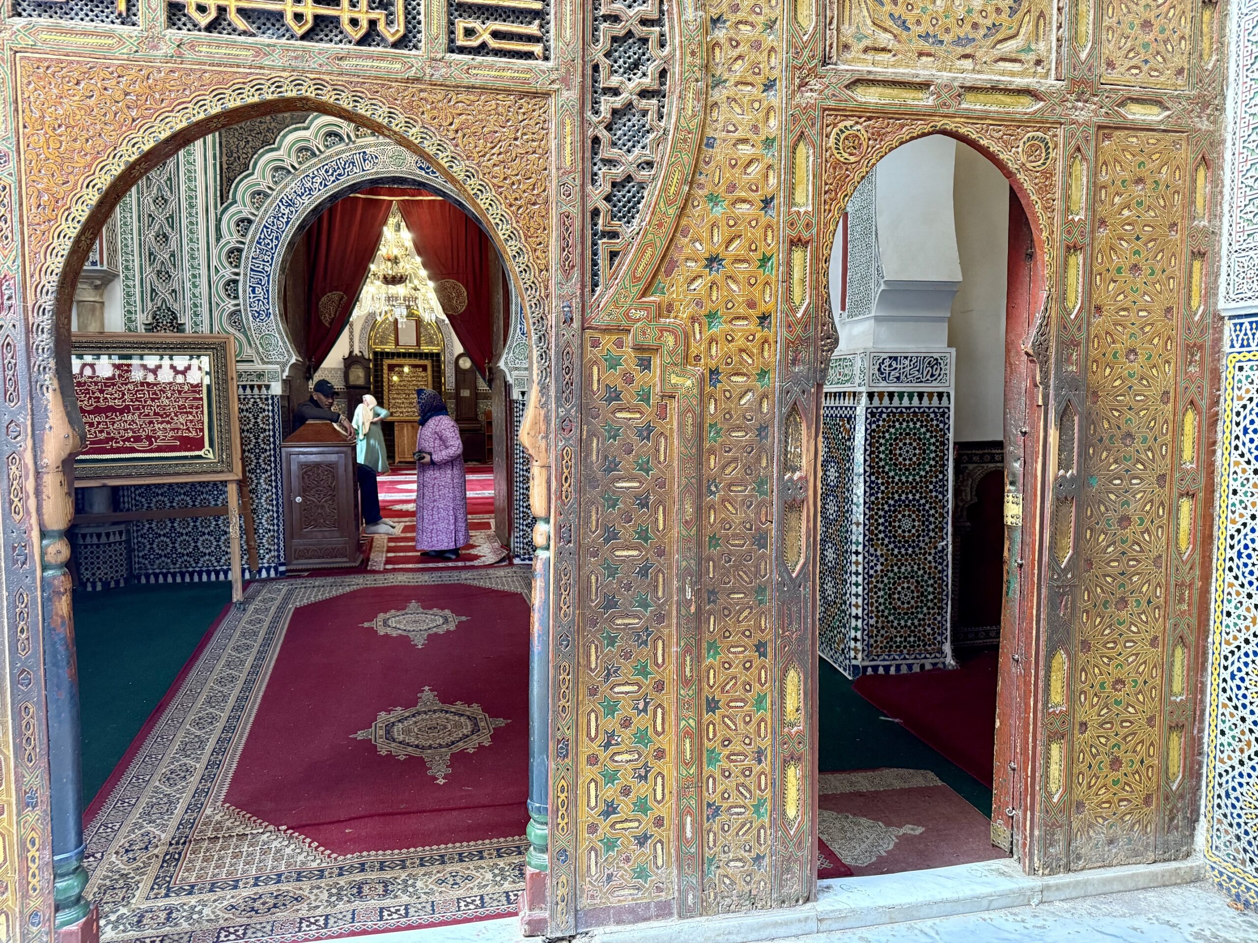 IMG_2978 Historic medina of Fes Morocco with narrow alleyways, traditional souks, and ancient Islamic architecture — UNESCO World Heritage Site and top cultural travel destination known for leather tanneries, artisan craftsmanship, and spiritual heritage in North Africa; travel guide to Fes