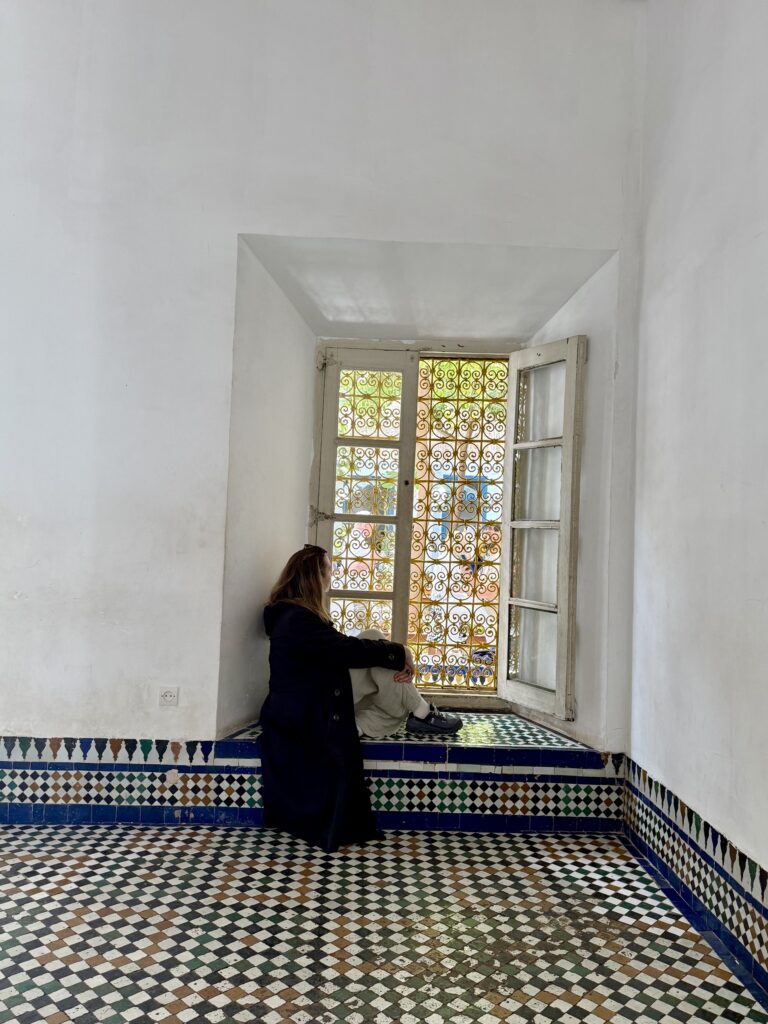 Vibrant street scene in Marrakech, Morocco featuring colorful souks, traditional riads, and the historic Koutoubia Mosque — top travel destination for Moroccan culture, architecture, and exotic shopping in North Africa; travel guide to Marrakech