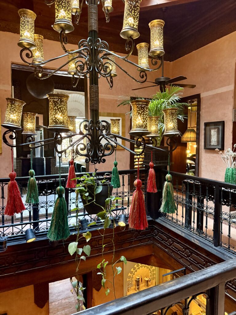 Vibrant street scene in Marrakech, Morocco featuring colorful souks, traditional riads, and the historic Koutoubia Mosque — top travel destination for Moroccan culture, architecture, and exotic shopping in North Africa.