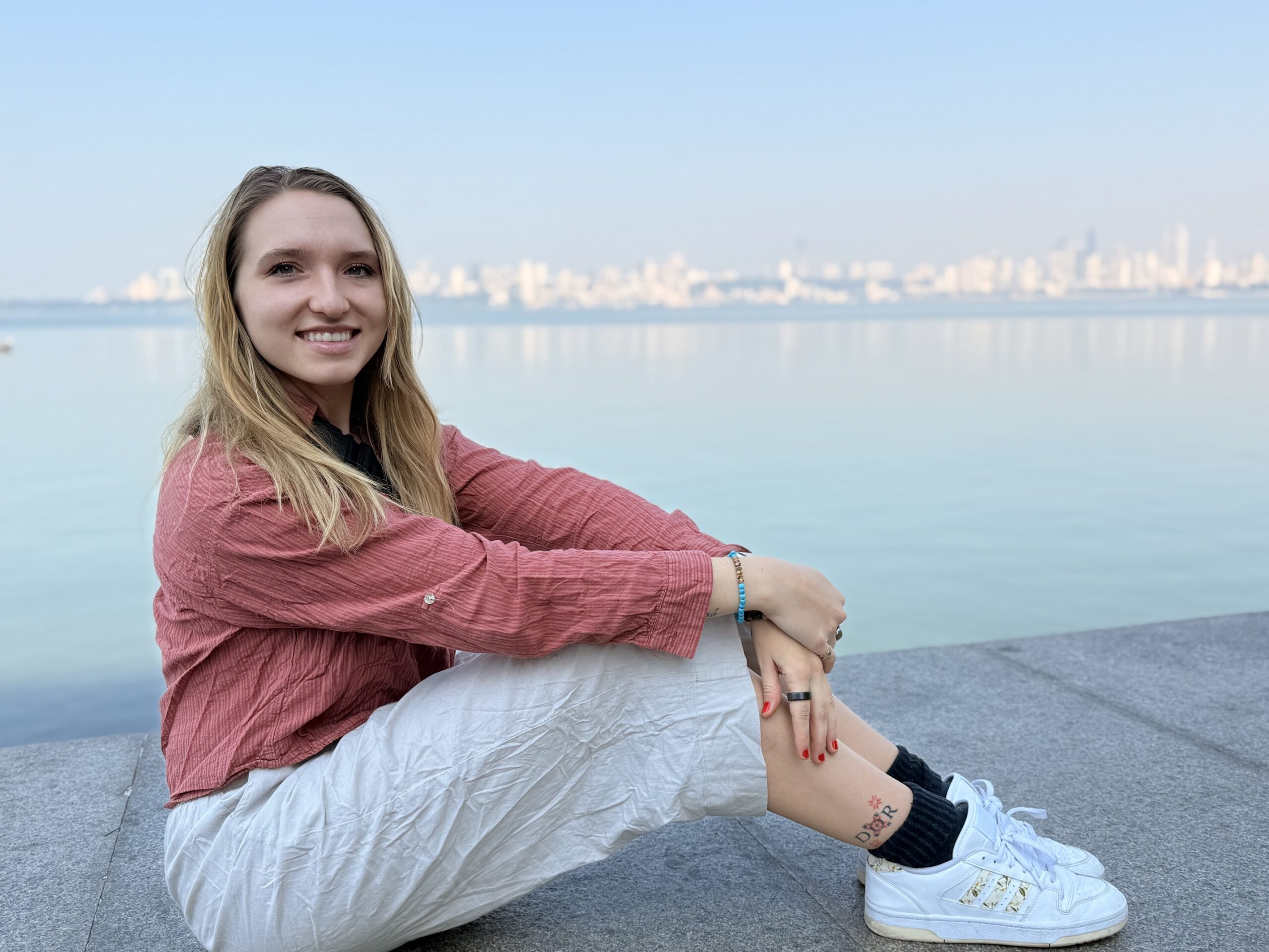 Busy street scene in Mumbai with tuk-tuks taxis and pedestrians. Travel guide to Mumbai