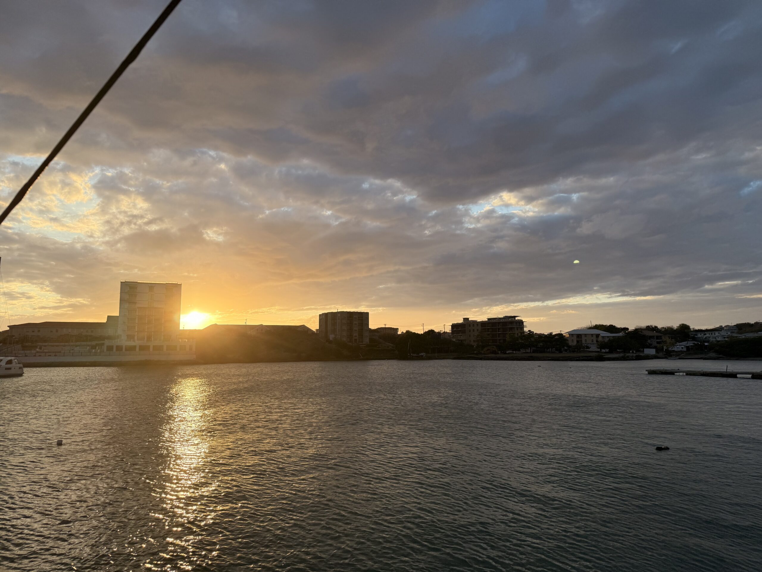 Pretty sunset on a beach in Grenada; travel guide to Grenada
