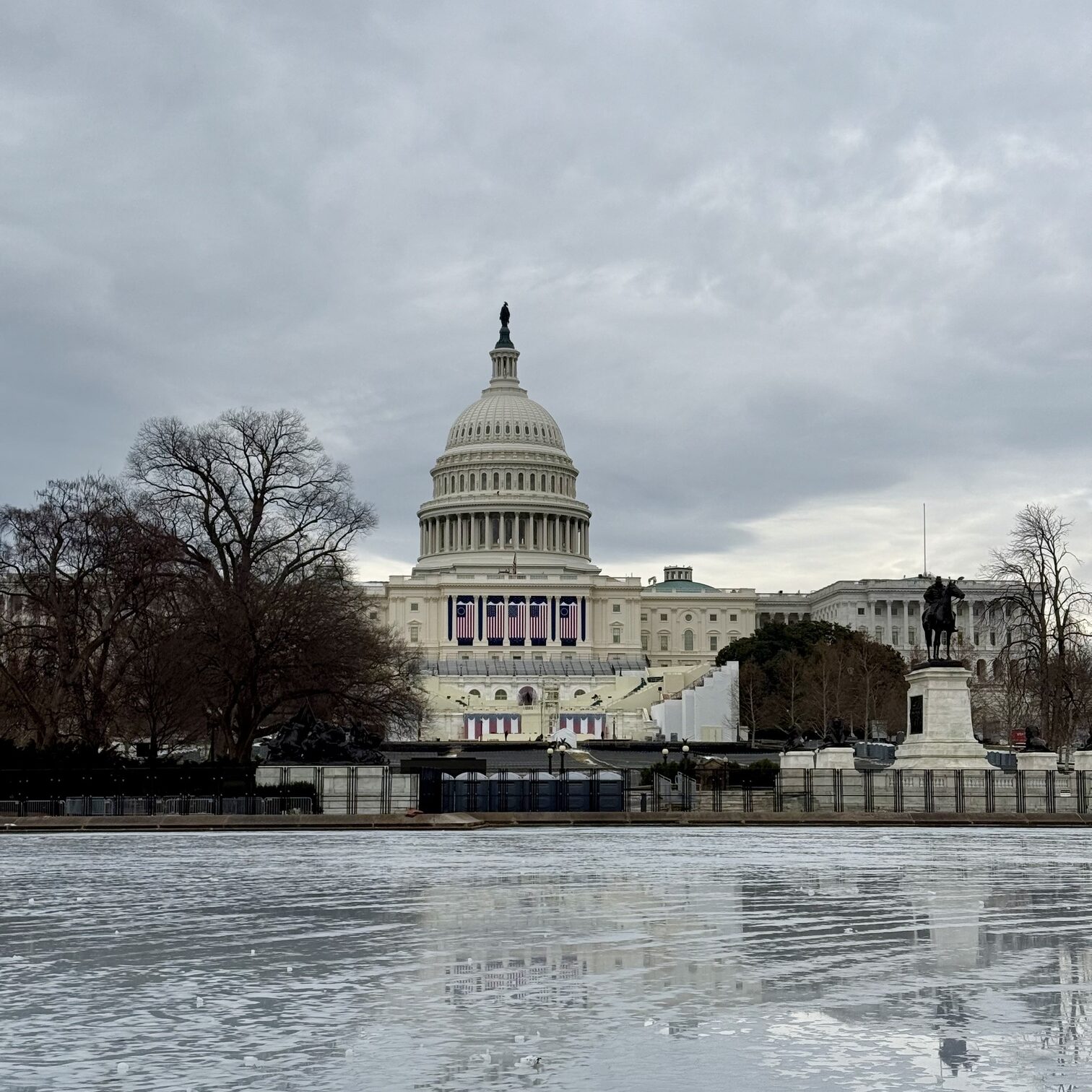 Scenic view of Washington, D.C., featuring the U.S. Capitol, Washington Monument, and cherry blossoms in full bloom. Explore iconic landmarks, historic museums, and cultural attractions in the nation's capital. Perfect for history buffs, political tourism, and travel photography.