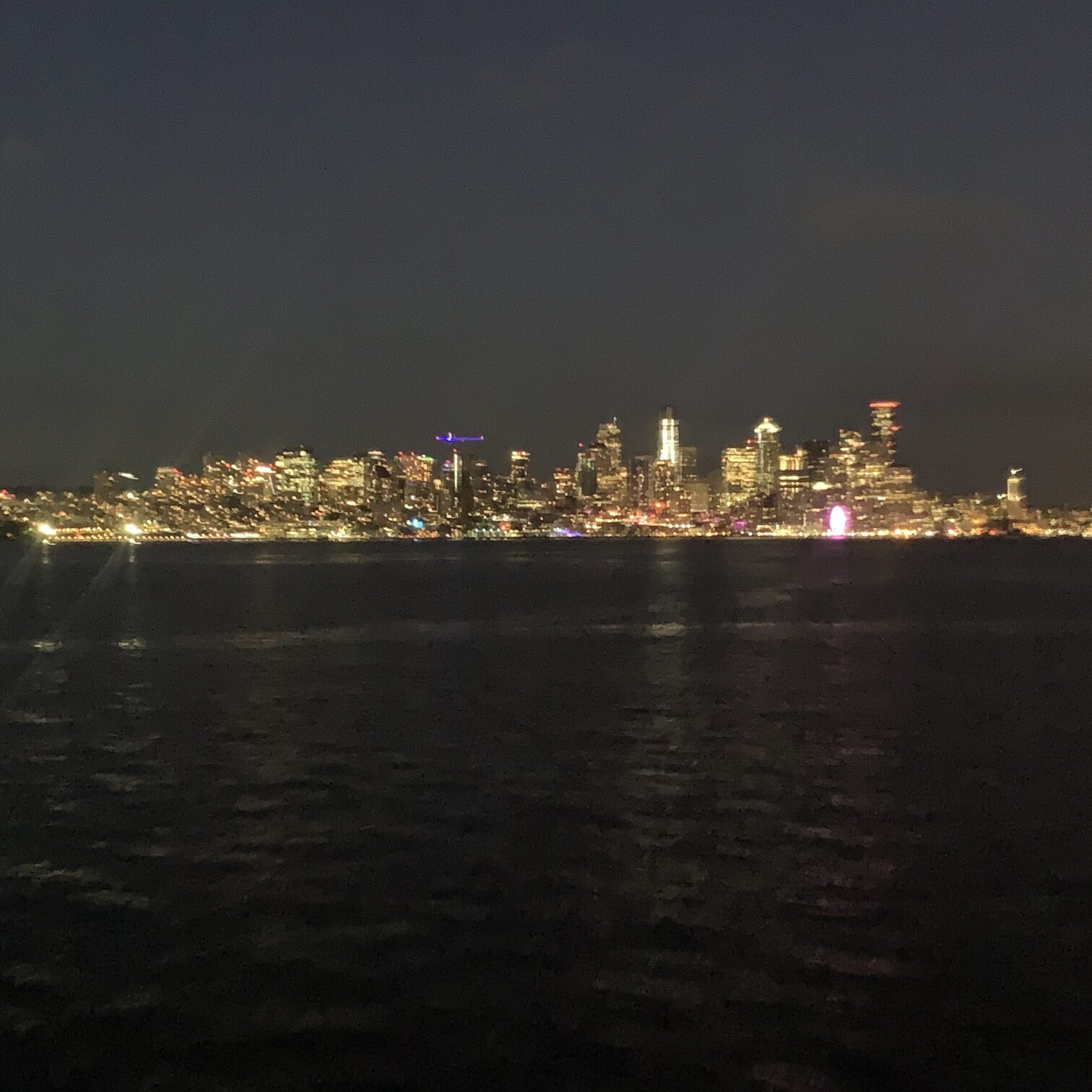 IMG_2780 Scenic view of Seattle, Washington skyline with the Space Needle, Mount Rainier in the background, and Elliott Bay waterfront — iconic Pacific Northwest travel destination, top attractions, and things to do in Seattle.