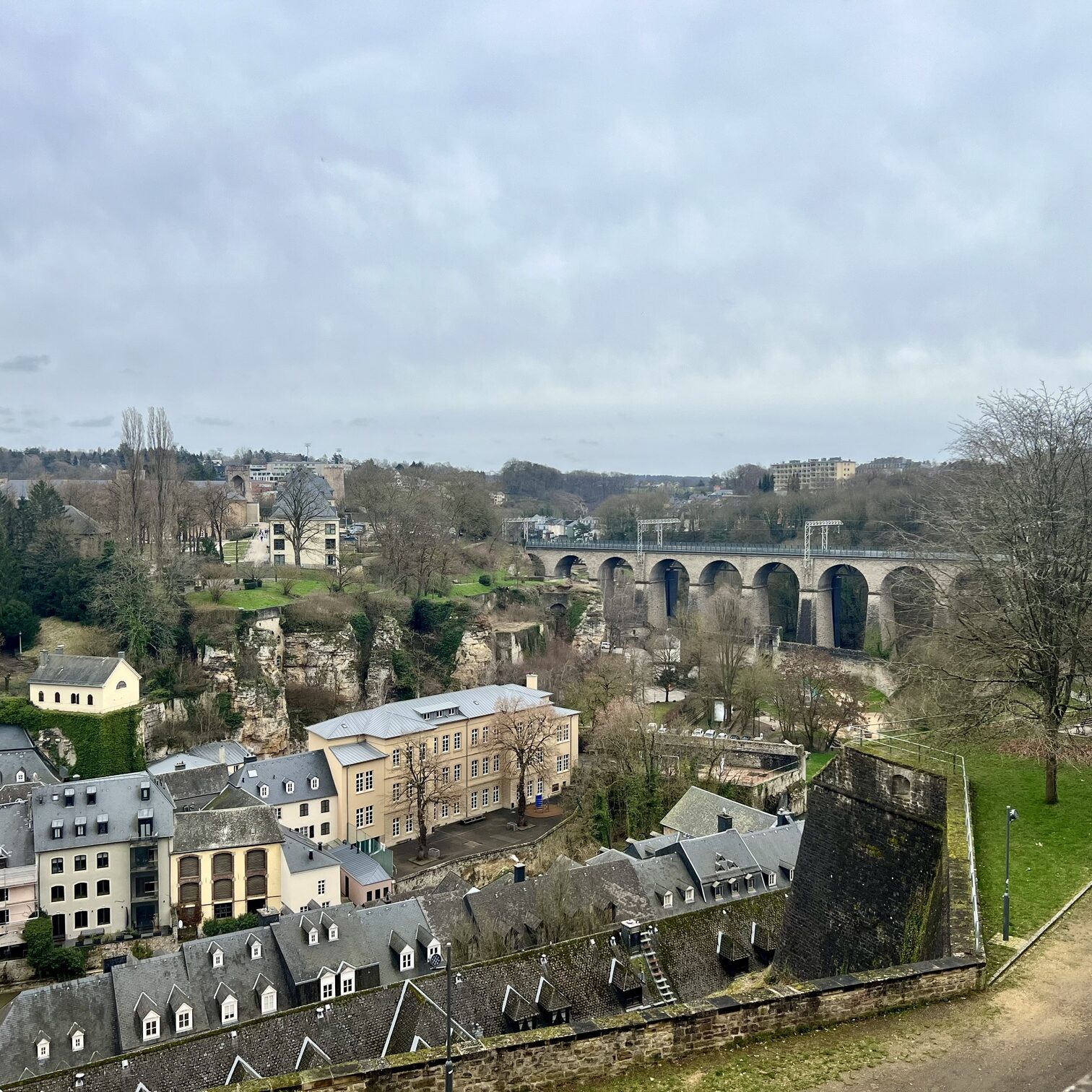 Spectacular view of Luxembourg City skyline with its historic bridges, medieval architecture, and the iconic Casemates du Bock, showcasing the charm and beauty of Luxembourg.