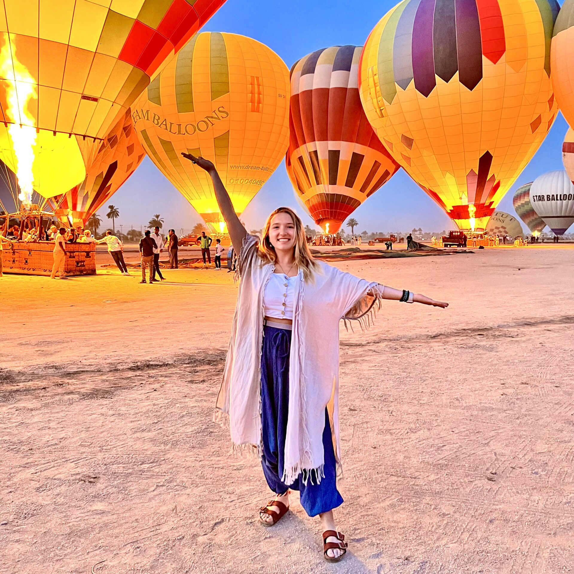 Hot air balloons soaring over Luxor, Egypt at sunrise, offering breathtaking views of ancient temples and the Nile—perfect for solo travel adventures, Rambling Adventurista explorations, and a culture travel blog.